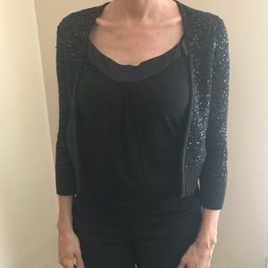 Express sequin shrug.